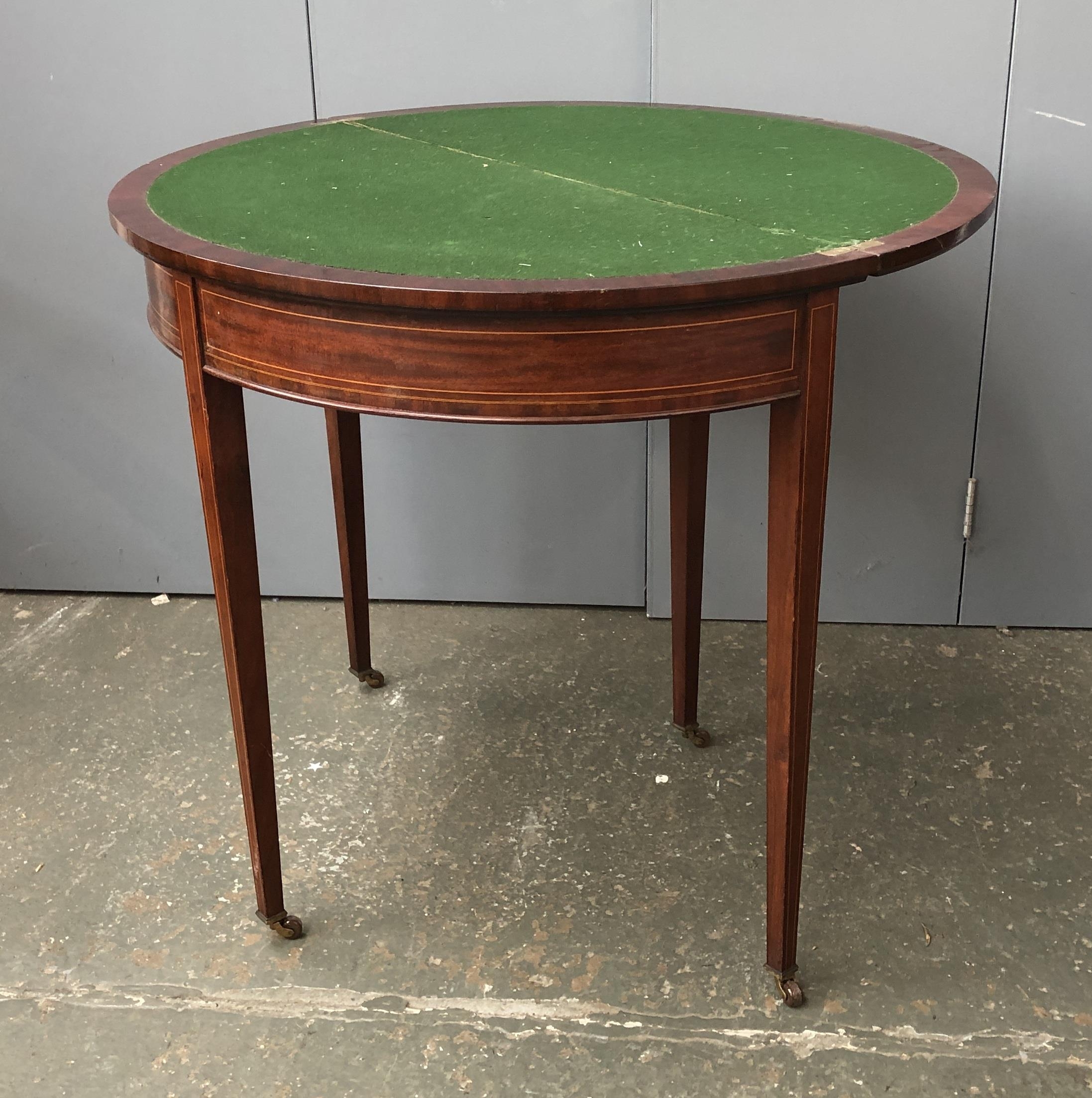 A 19th century demilune card table, on square tapered legs with casters, 84x42x74cmH - Image 2 of 2