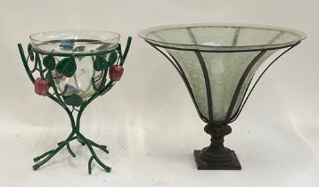 A glass fruit bowl on a painted wrought metal stand, 37cmH, together with a large glass vase in a