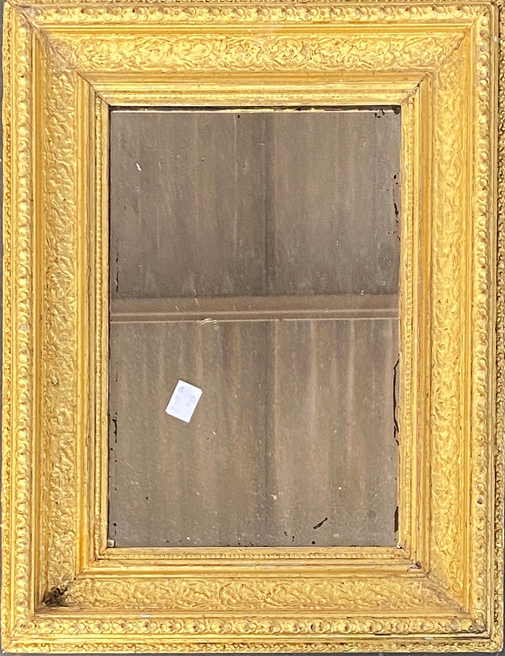 A small gilt gesso framed mirror, 44x33cm overall