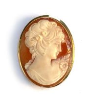 An 18ct gold mounted shell cameo brooch, 3.8cmL, gross weight 7g