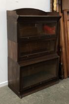 'The Lebus Bookcase', an early 20th century Globe Wernicke style three part oak sectional