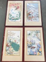 A set of four prints by Wei Tseng Yang on silk depicting peacocks, mandarin ducks, cranes and