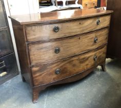 A Regency bowfront chest of three graduating drawers, on swept bracket feet, 110x55x82cmH