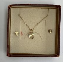 A 9ct gold bright cut heart necklace and matching stud earrings, 0.7g