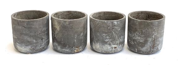 A set of four composite planters, 15cmH