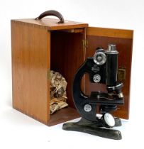 A boxed Beck of London model 46 microscope