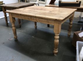 A large pine farmhouse table on turned legs, 137x111x77cmH