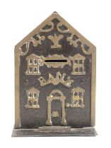 A cast metal and brass mounted money bank, modelled as a house, 18cmH