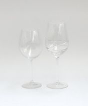 A quantity of large wine glasses, two with incised swirl design (13 in total)