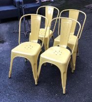 A set of 4 yellow painted metal stackable garden chairs