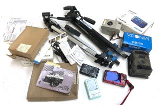 A mixed lot of photography equipment to include tripods, photography paper, Olympus VG-130,