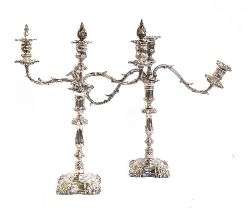A pair of three arm plated candlesticks, each approx. 46cm high