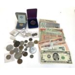 A quantity of coins and banknotes to include US 200 dollar moral reserve note, Australian $1 proof