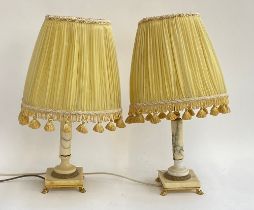 A pair of marble style and gilt metal table lamps with shades, 46cmH overall