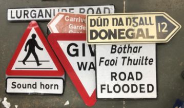 A quantity of road signs to include road flooded, give way, Donegal, etc