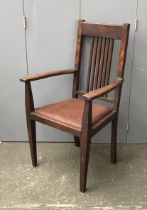 An Arts and Crafts oak open armchair, 63cmW