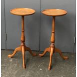 A pair of 20th century fruitwood wine tables, with dish tops, 27x59cmH