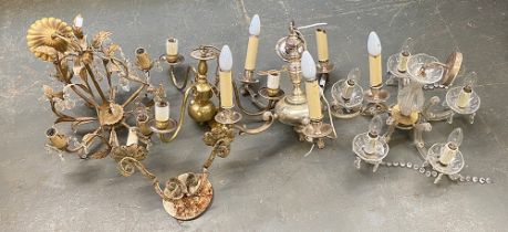 A heavy silver plated five arm chandelier; a gilt metal three arm chandelier; a floral wrought metal