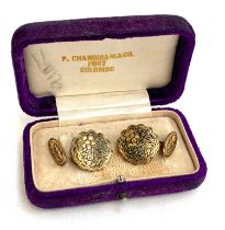 A pair of Japanese yellow metal damascene cufflinks, the reverse stamped with an elephant, 2cmD