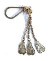 A white metal keyring with three tabs with Arabic script, hallmarked, 25g