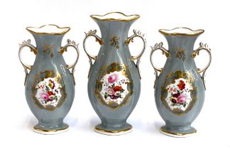 A set of three late 19th/early 20th century twin handled vases, grey ground with central hand