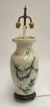 A Chinese crackle glazed twin fitting table lamp (af, in need of new feet), painted with shrimp,