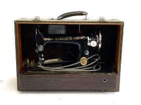 A Singer sewing machine, S/N EA847547in faux aligator box