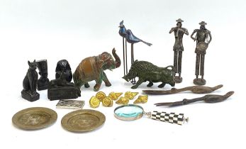 A mixed lot to include gilt metal seashell shaped napkin rings; painted elephant; carved warthog (