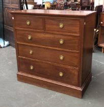 An Edwardian mahogany and cross banded chest of two short over three long drawers on plinth base