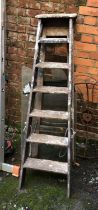 A vintage wooden seven rung stepladder, approx 160cmH