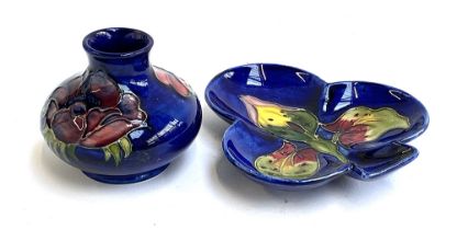 A Moorcroft clover shaped pin dish with orchid design, 13.5cmW; together with a Moorcroft vase of