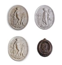 Four decorative wall plaques, being plastic casts depicting classical maidens and profiles three