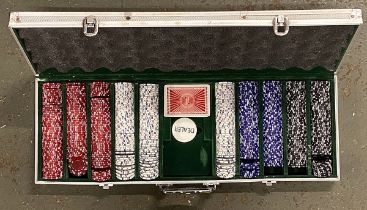 A set of poker chips, in aluminium flight case