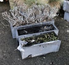 A set of three graduating composite garden planters, the largest 70cmW 20cmD 20cmH