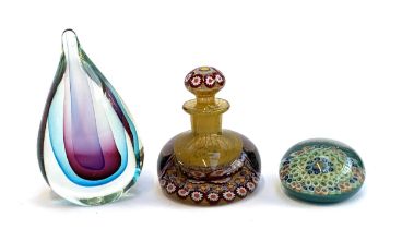 A millefiori glass paperweight, 7.5cmD, together with a millefiori glass bottle, 11.5cmH, and a
