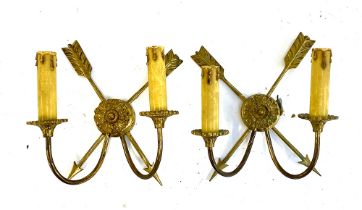 Interior design interest: A pair of gilt metal two arm electric wall sconces, with rosette and arrow