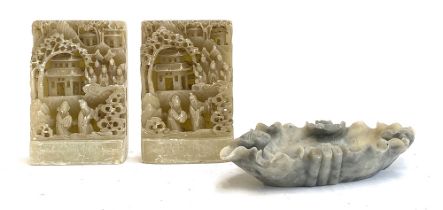 Two Chinese carved soapstone plaques depicting pagodas and figures, each 17.5cmH; together with a