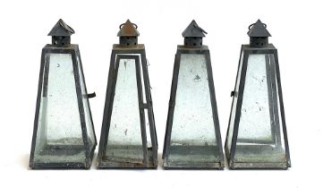 Four metal framed lanterns of trapezium form (af), 39cmH