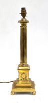 A gilt metal column table lamp, with laurel wreath design to base, 45cmH