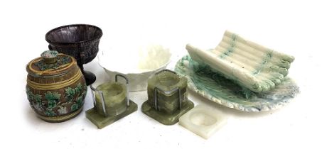 A Victorian slag glass goblet; Majolica tobacco jar; continental asparagus dish; Onyx coasters and