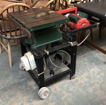 A table saw, with a Brook Crompton Parkinson Motor, on wheels