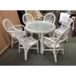 A white painted bamboo conservatory set comprising circular table with glass top, 92cmD 71cmH, a