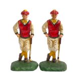 A pair of painted cast iron doorstops in the form of golfers, 26cmH