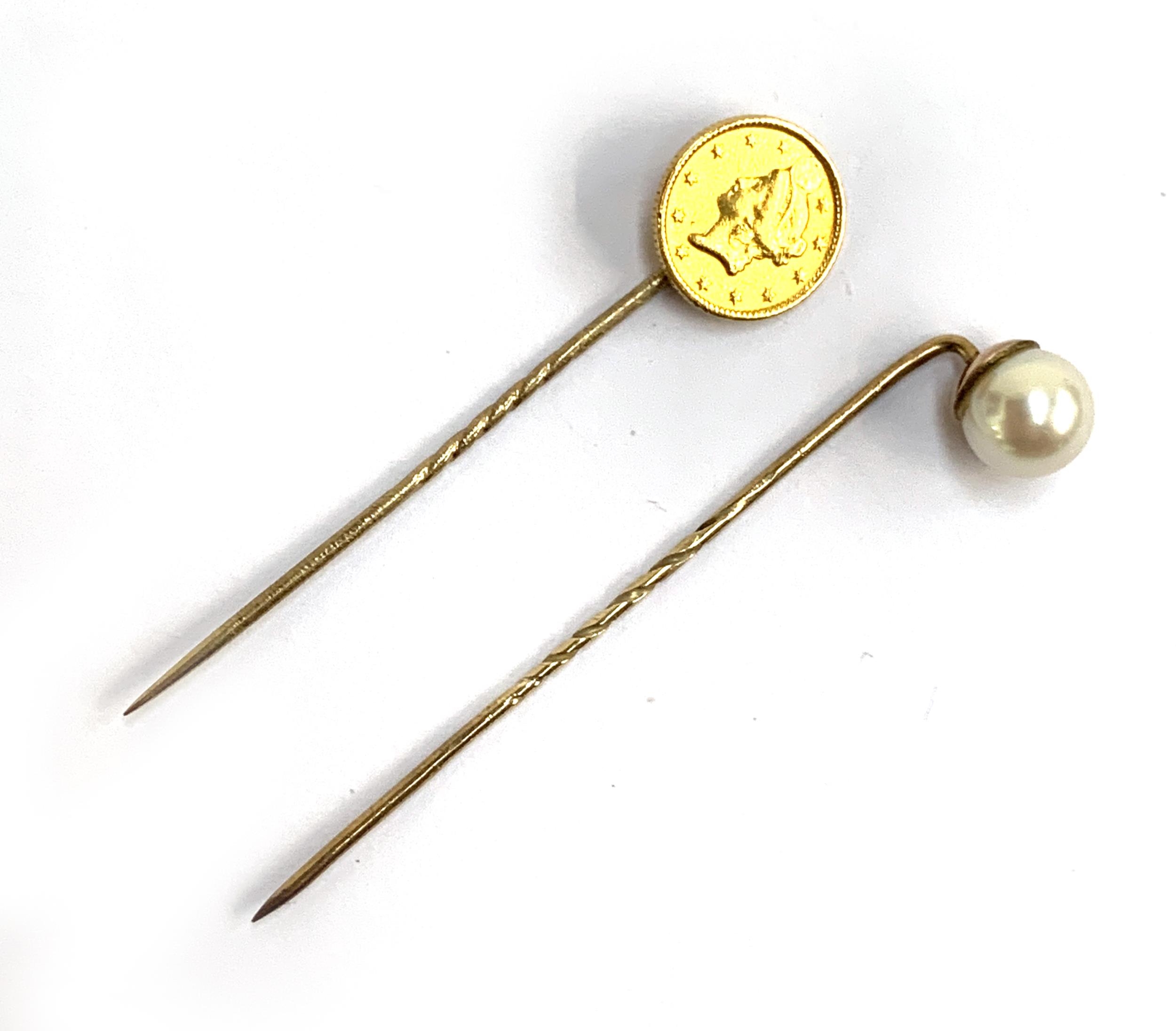 A gold 1851 United States of America One Dollar stickpin, with repaired drilled hole, gross weight