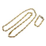A Celine Maillon Triomphe link gold plated chain, approx. 110cm long unclasped, together with a