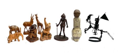 A lot of various figures to include carved wooden animals, carved Chinese fisherman, abstract