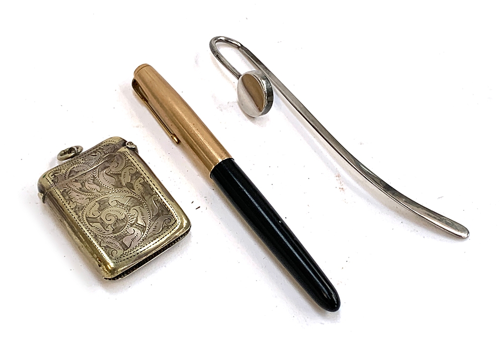 A hallmarked silver bookmark, 15g; a Parker pen; and a vesta with engraved design