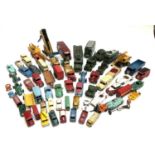 A large quantity of play worn die cast model vehicles, mainly Dinky, to include TV mobile control
