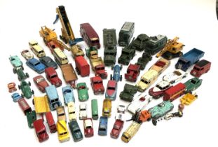 A large quantity of play worn die cast model vehicles, mainly Dinky, to include TV mobile control