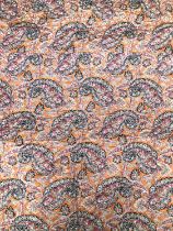 A paisley and floral orange ground bed spread, approx 175x205cm; together with one other, red ground